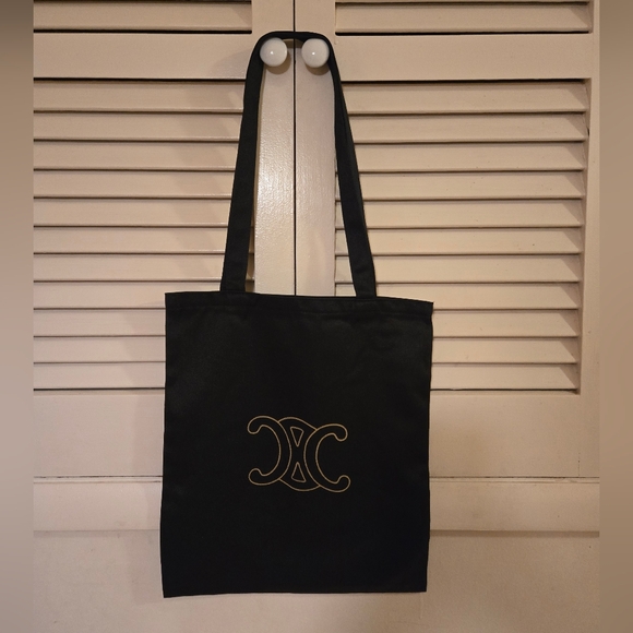 Celine Handbags - Brand new!! Brand new authentic Celine luxury large black canvas tote with logo